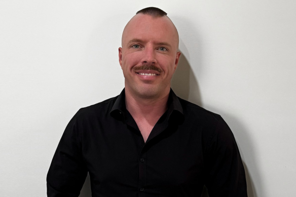 Profile photo of Alex Simpson, creator of the Global Voices Content Mentorship Program at NSF