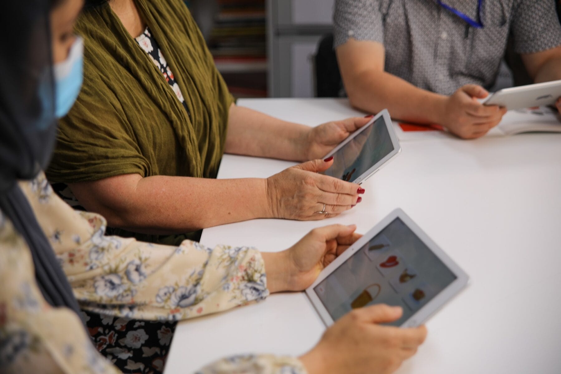 students on tablets