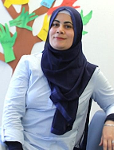 Photo of woman wearing head scarf