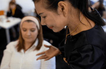 Close up shot of a female teacher and student at a beauty course