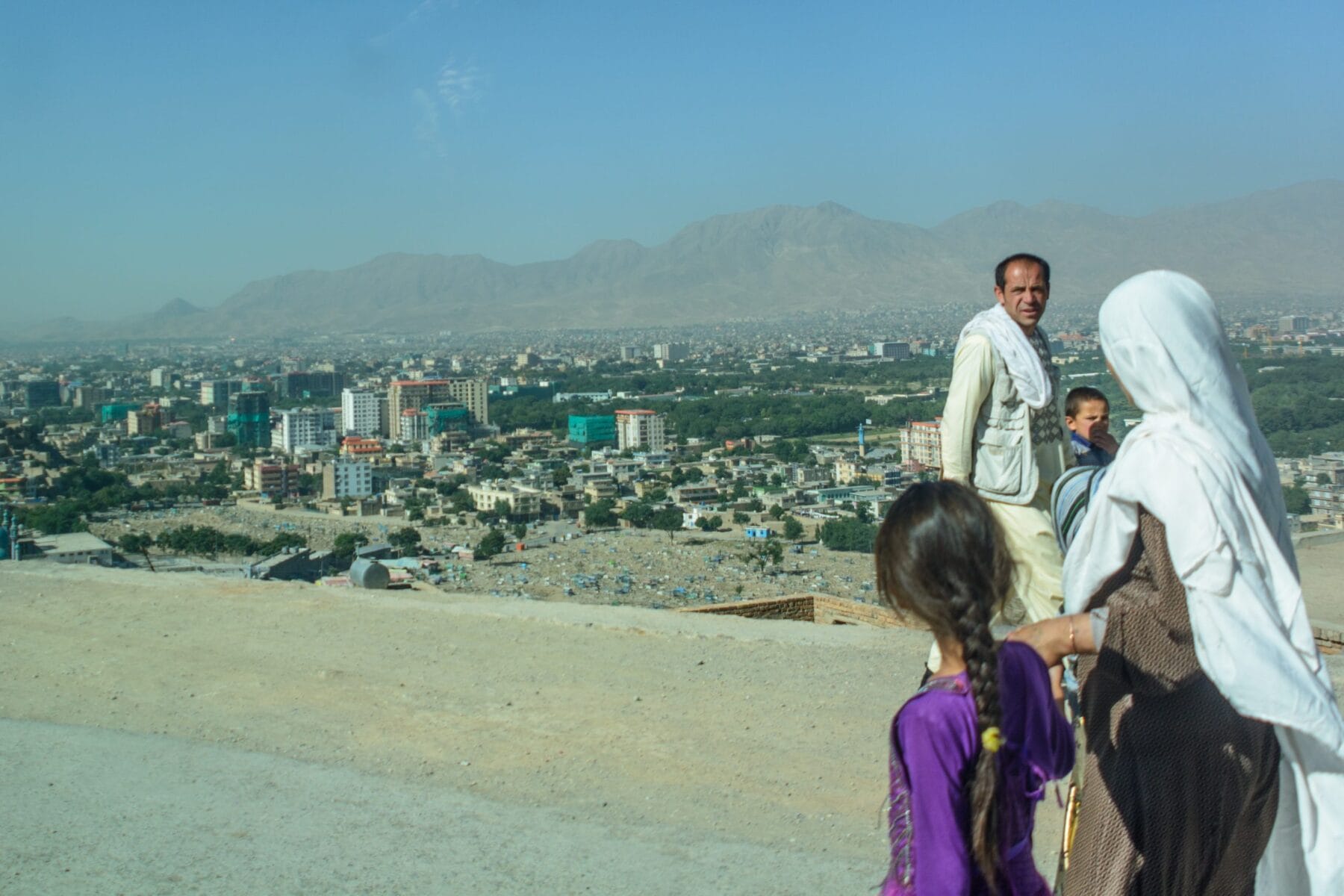 Family walking in Kabul Afghanistan